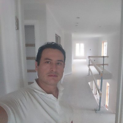 Alberto Mendez, owner of NCR Pro-Painting, on-site managing a residential interior painting and home readiness project in Ottawa.